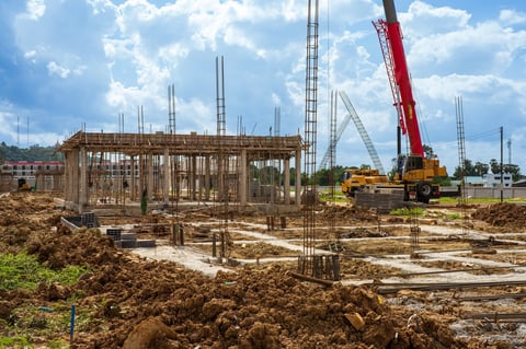 Residential building under construction with brick structure